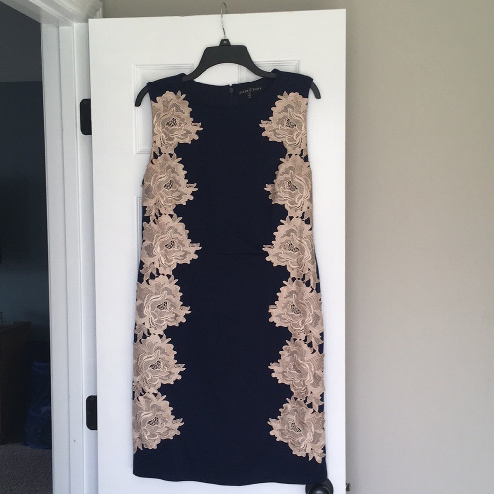 Navy dress with champagne lace applique.